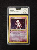 Carte Pokemon 
Contenu : Mewtwo
Edition : 1er édition du set de base...