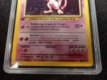 Carte Pokemon 
Contenu : Mewtwo
Edition : 1er édition du set de base...