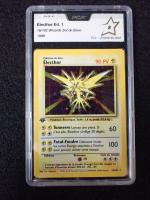 Carte Pokemon 
Contenu : Electhor
Edition : 1er édition du set de base...