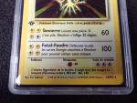 Carte Pokemon 
Contenu : Electhor
Edition : 1er édition du set de base...