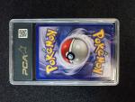 Carte Pokemon 
Contenu : Melofée
Edition : 1er édition du set de base...