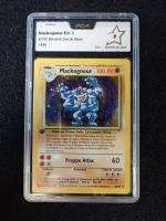 Carte Pokemon 
Contenu : mackogneur
Edition : 1er édition du set de base...