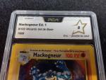 Carte Pokemon 
Contenu : mackogneur
Edition : 1er édition du set de base...