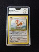 Carte Pokemon 
Contenu : Roucoups
Edition : 1er édition du set de base...